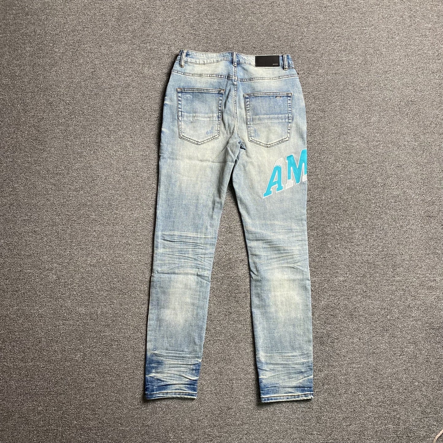 AMIRI VARSITY LOGO JEANS - Sin Sity Reps