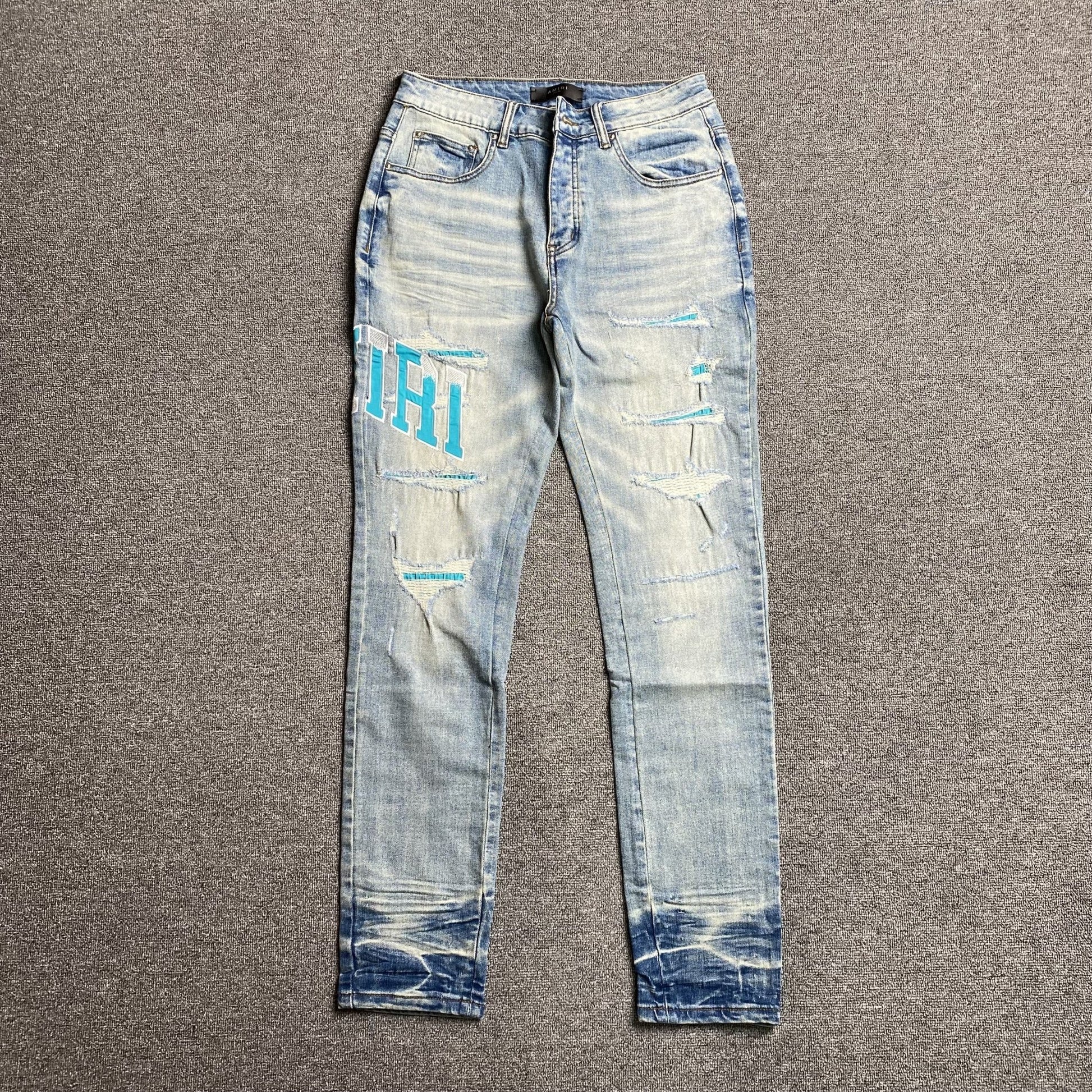 AMIRI VARSITY LOGO JEANS - Sin Sity Reps