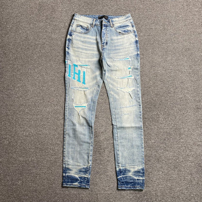 AMIRI VARSITY LOGO JEANS - Sin Sity Reps