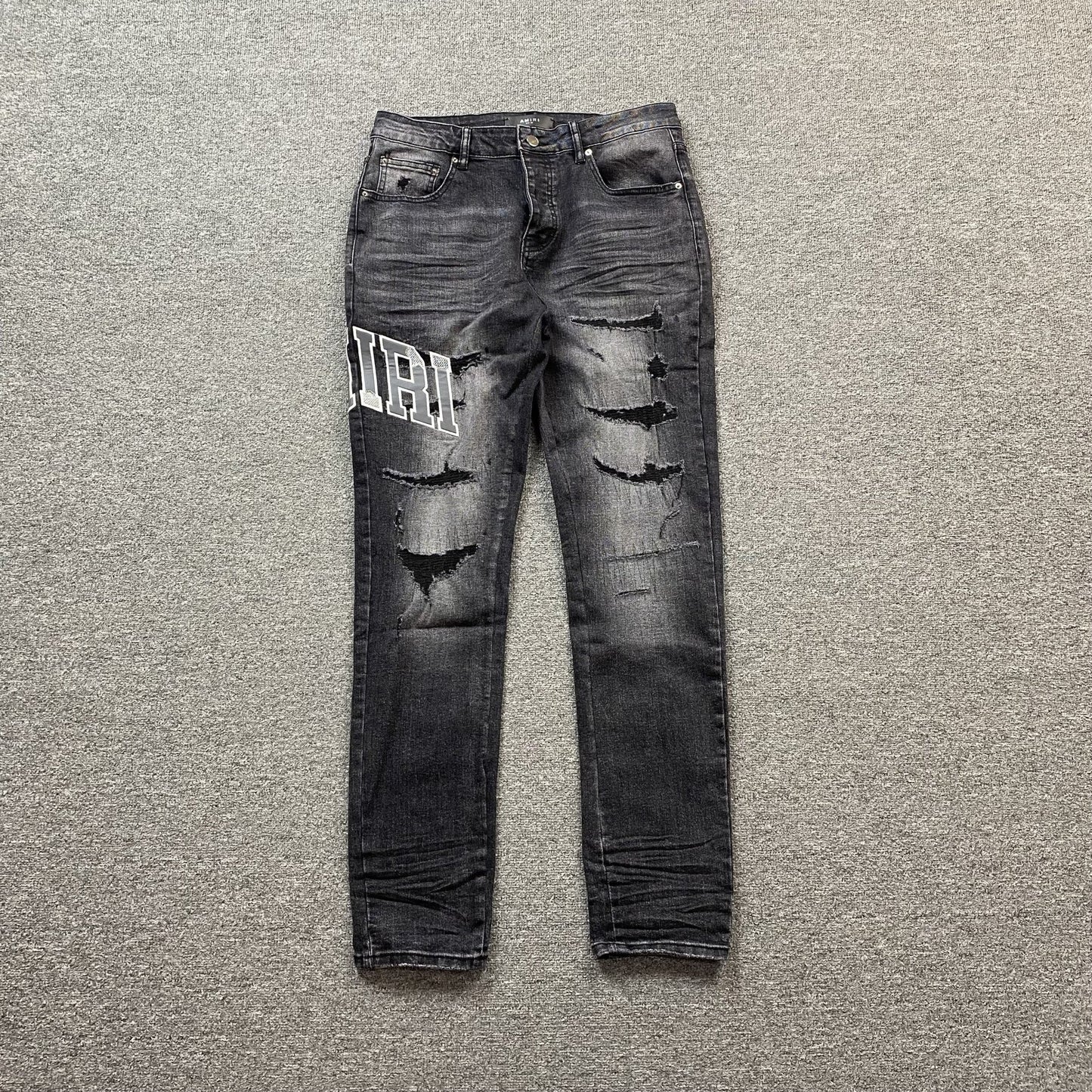 AMIRI VARSITY LOGO REPAIR JEANS - Sin Sity Reps