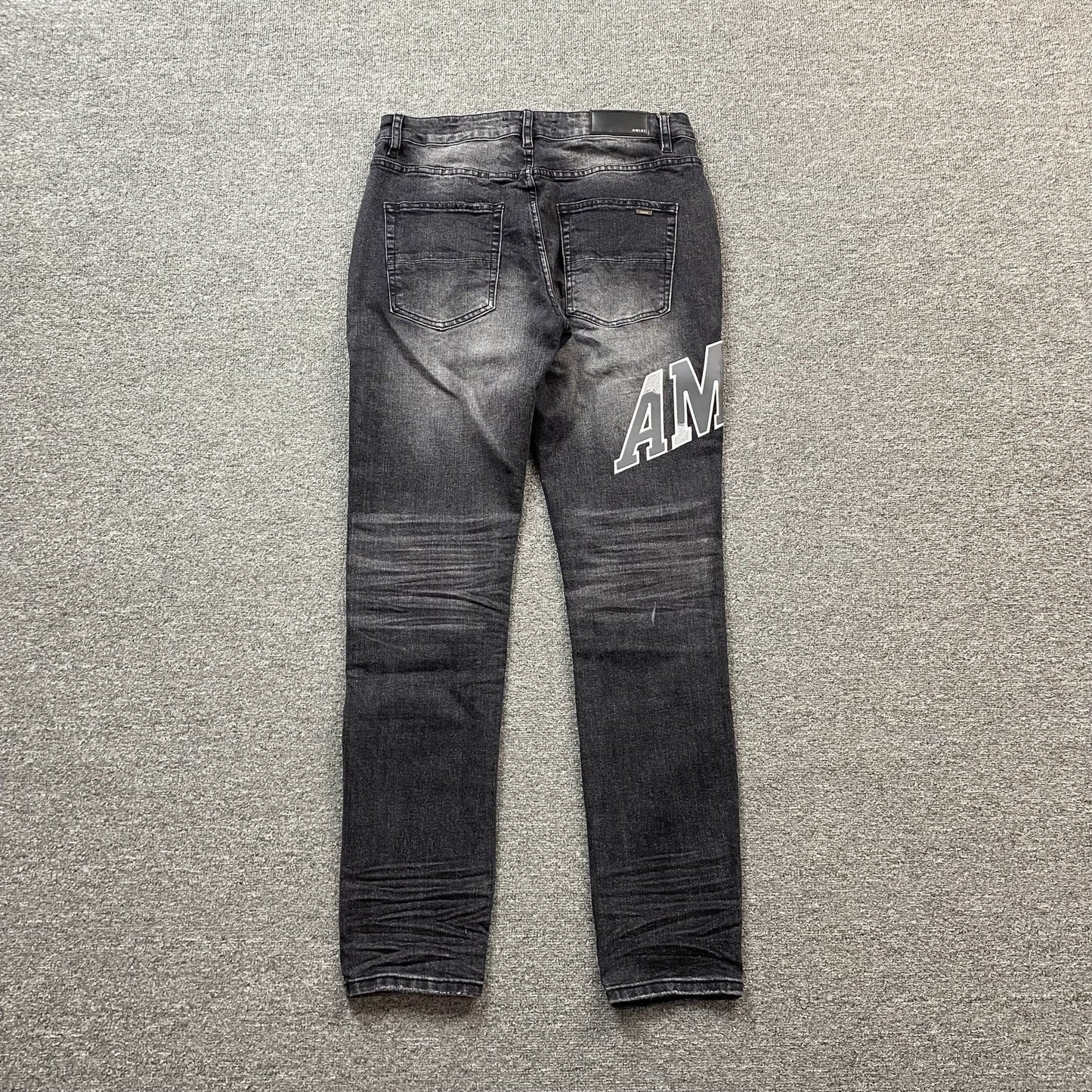 AMIRI VARSITY LOGO REPAIR JEANS - Sin Sity Reps