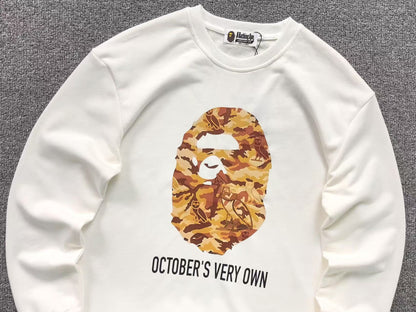 BAPE x OVO WOODLAND CAMO APE HEAD SWEATSHIRT WHITE - Sin Sity Reps