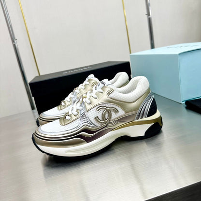 CHANEL CC RUNNERS SNEAKERS WHITE AND GOLD - Sin Sity Reps