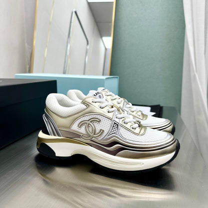 CHANEL CC RUNNERS SNEAKERS WHITE AND GOLD - Sin Sity Reps