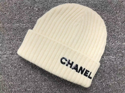 CHANEL CLOCHE WHITE SEQUIN LETTER LOGO BEANIE CREAM - Sin Sity Reps