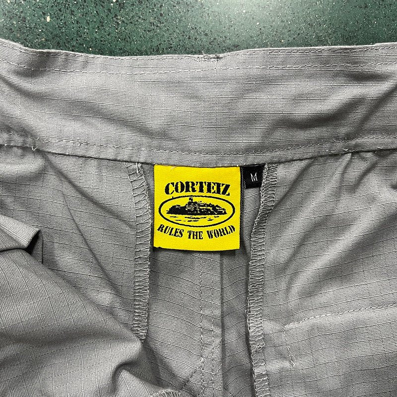 CORTEIZ CARGO PANTS STONE GREY - Sin Sity Reps