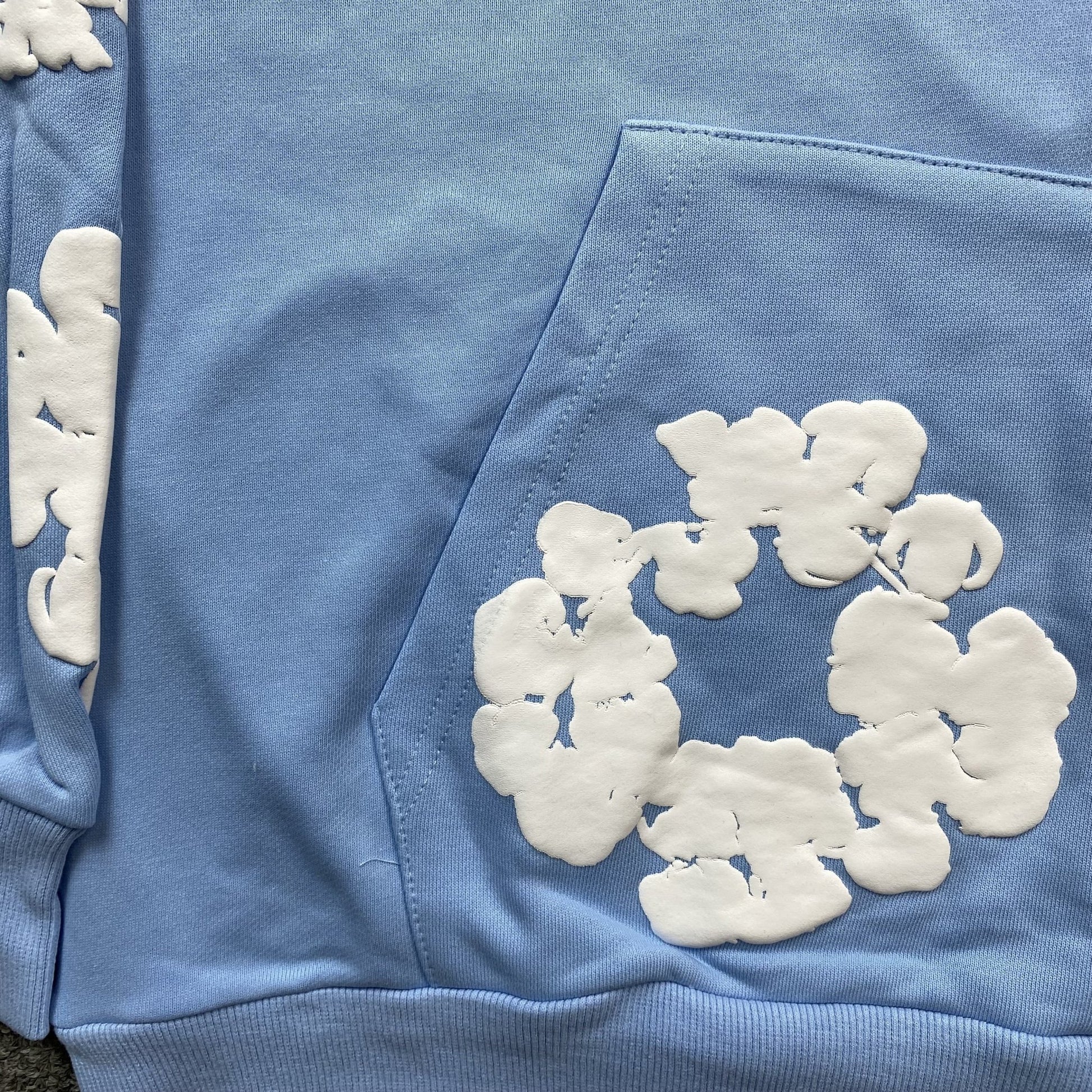 DENIM TEARS COTTON WREATH HOODIE BABY BLUE - Sin Sity Reps