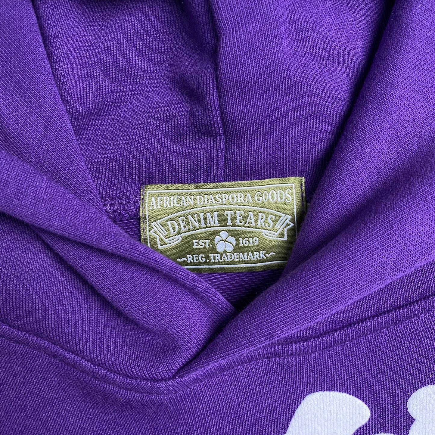 DENIM TEARS COTTON WREATH HOODIE PURPLE - Sin Sity Reps