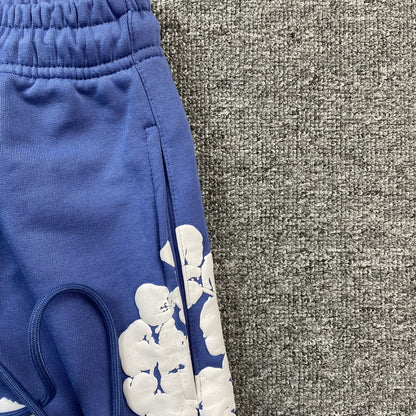 DENIM TEARS COTTON WREATH SWEATPANTS BLUE - Sin Sity Reps