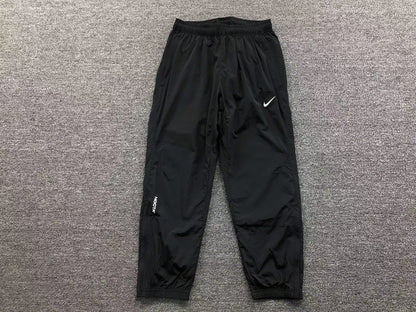 NIKE x NOCTA NORTHSTAR NYLON TRACK PANTS BLACK - Sin Sity Reps