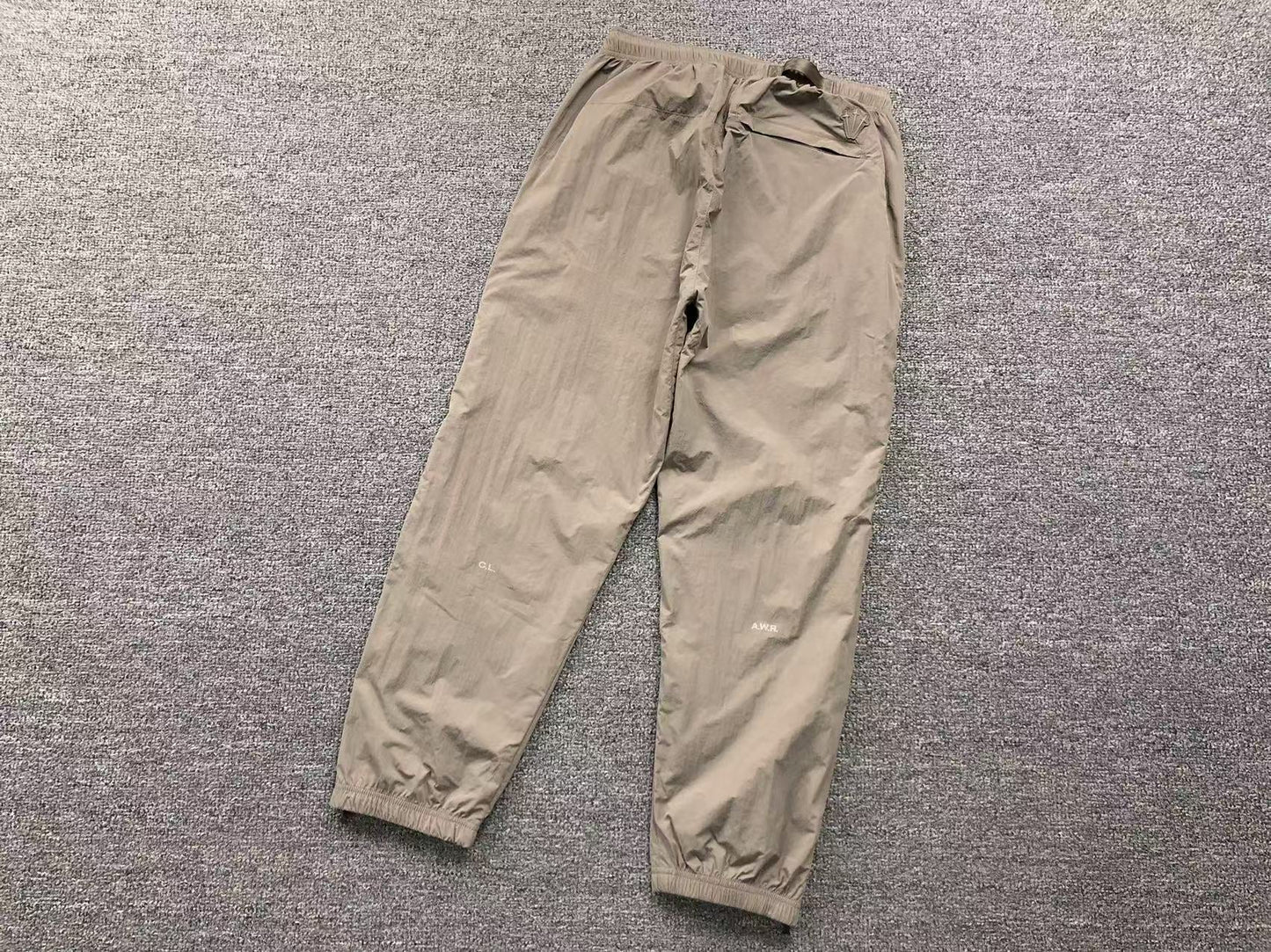 NIKE x NOCTA NORTHSTAR NYLON TRACK PANTS HEMP - Sin Sity Reps