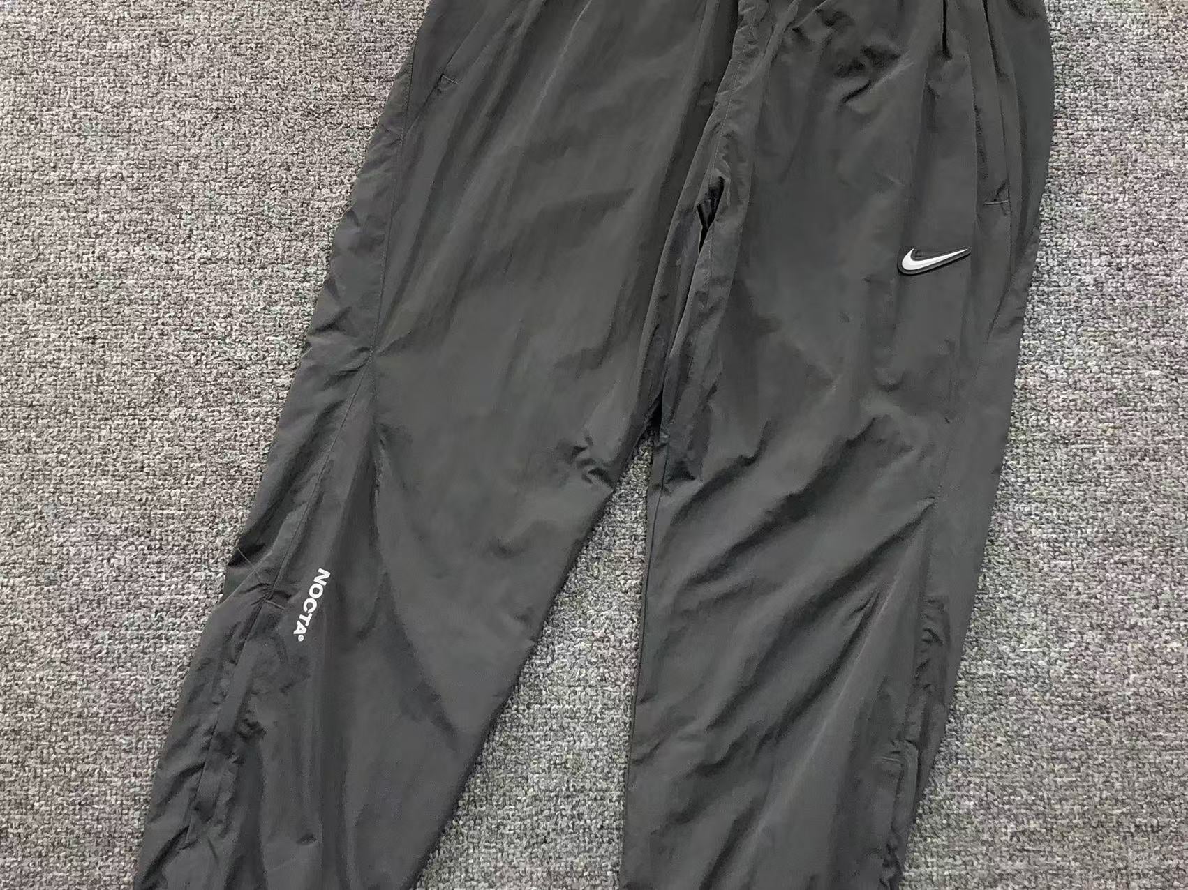 NIKE x NOCTA NORTHSTAR NYLON TRACK PANTS IRON GREY - Sin Sity Reps