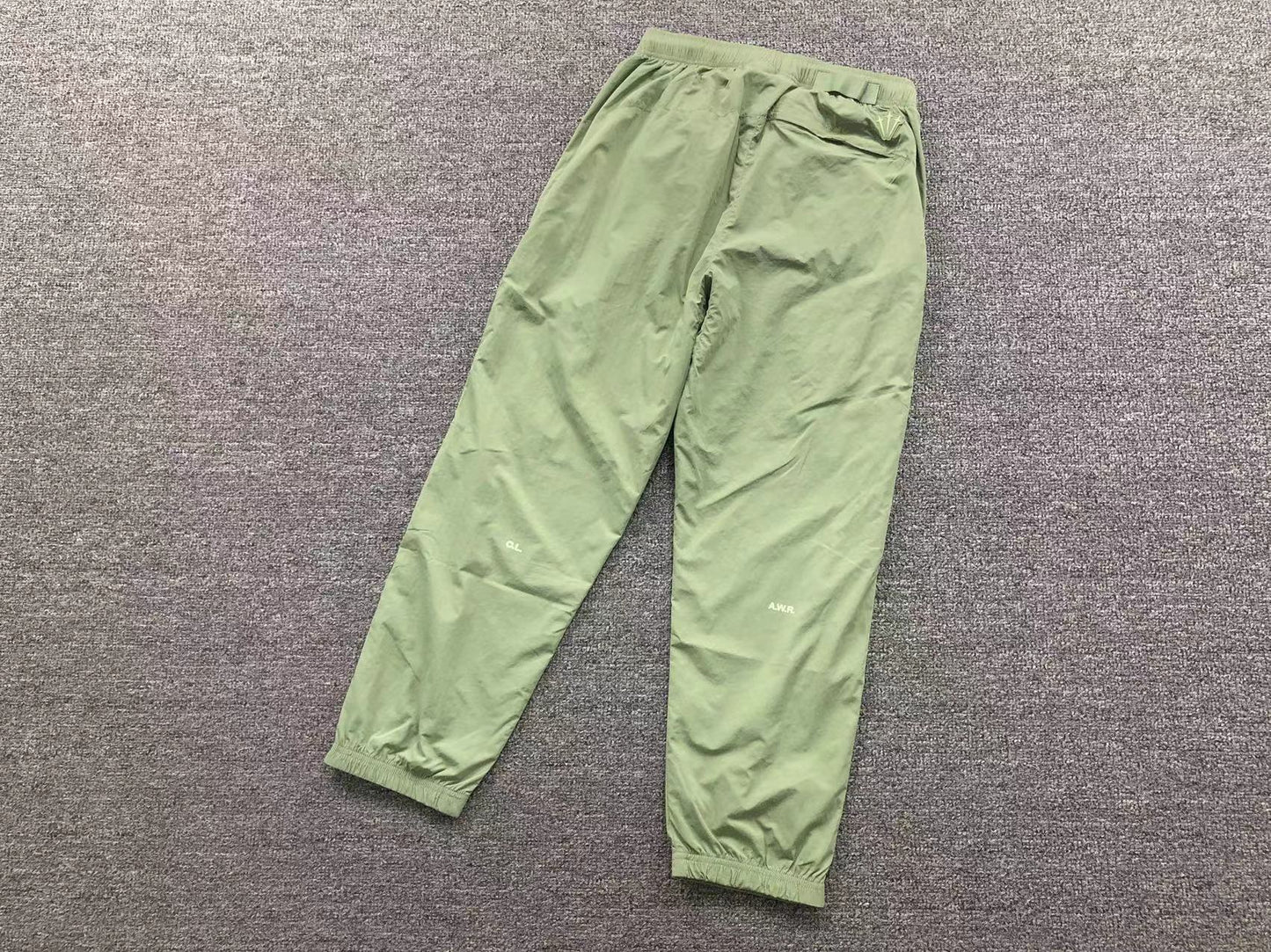 NIKE x NOCTA NORTHSTAR NYLON TRACK PANTS OIL GREEN/LIGHT LIQUID LIME - Sin Sity Reps