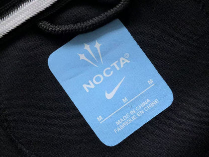 NIKE x NOCTA TECH FLEECE CREWNECK STADIUM BLACK GOLD - Sin Sity Reps