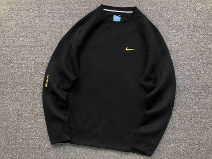 NIKE x NOCTA TECH FLEECE CREWNECK STADIUM BLACK GOLD - Sin Sity Reps