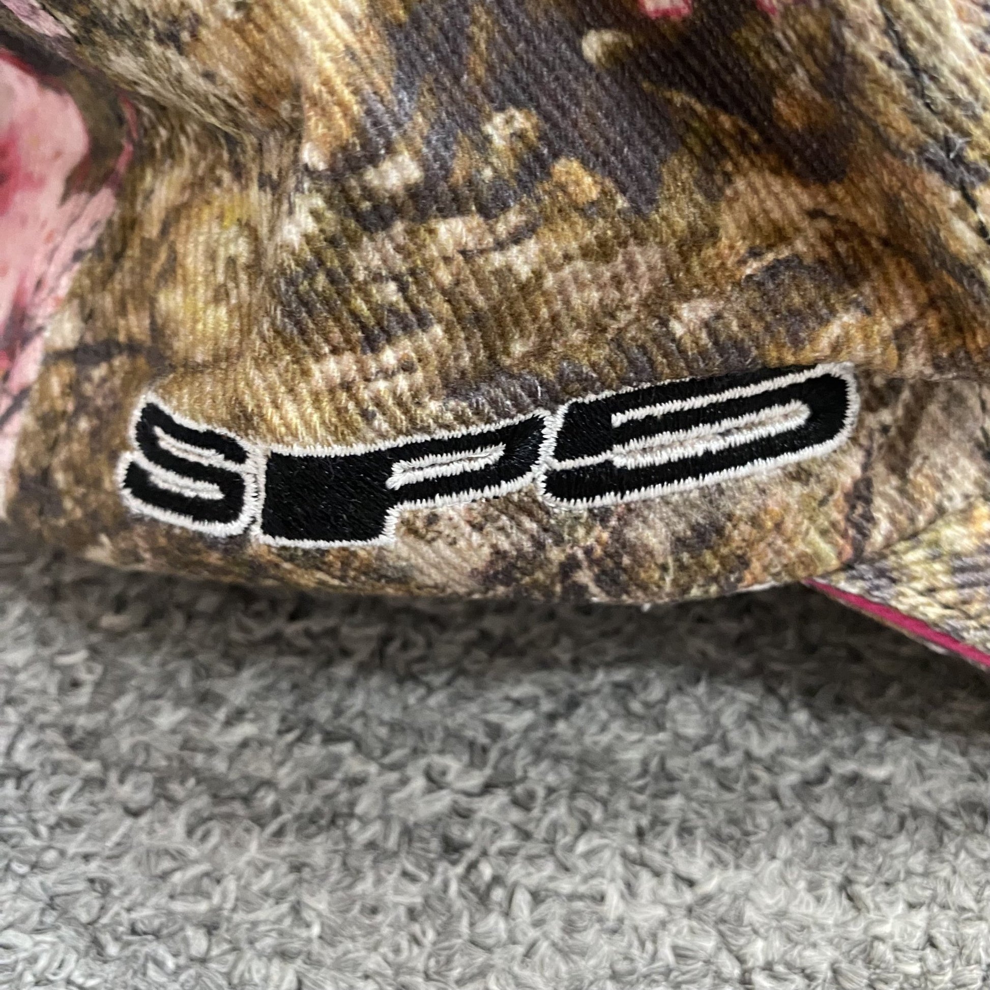 SP5DER BLUE LOGO CAP REAL TREE CAMO - Sin Sity Reps