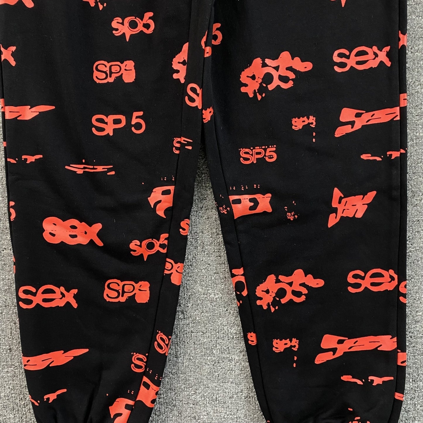 SP5DER SEX AOP SWEATPANTS BLACK - Sin Sity Reps